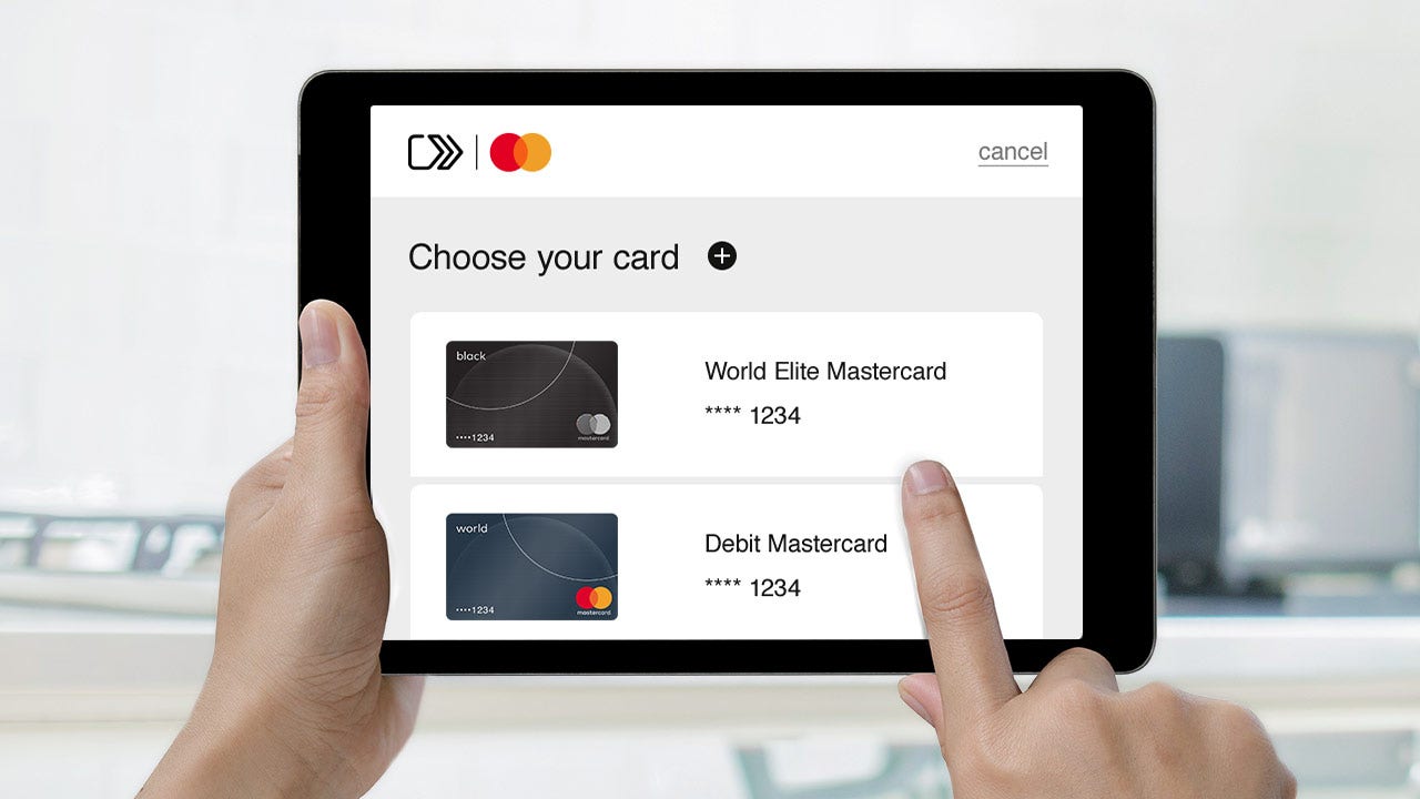 Choose your saved card at checkout on an ecommerce website.