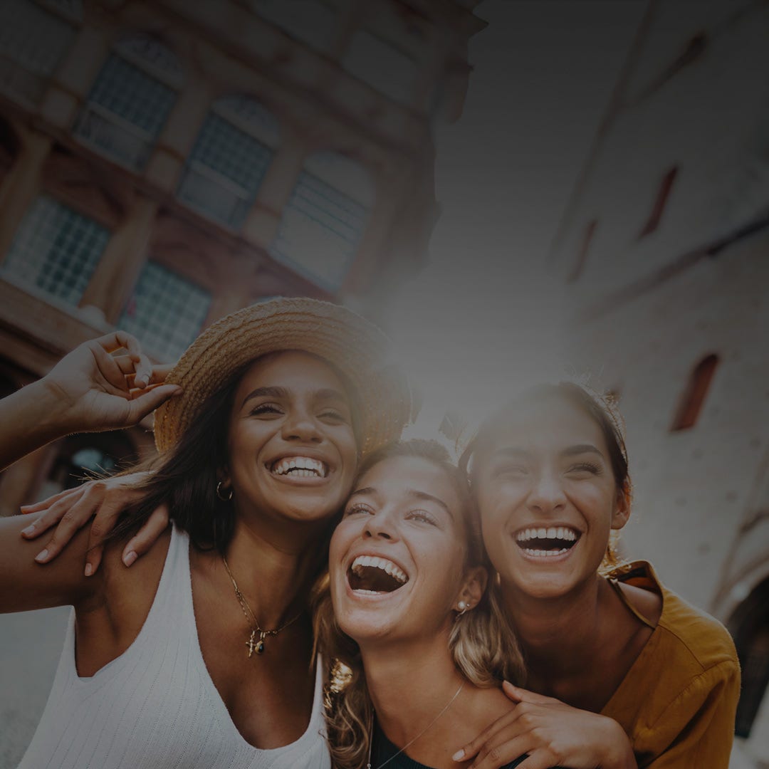 Three young women having fun.