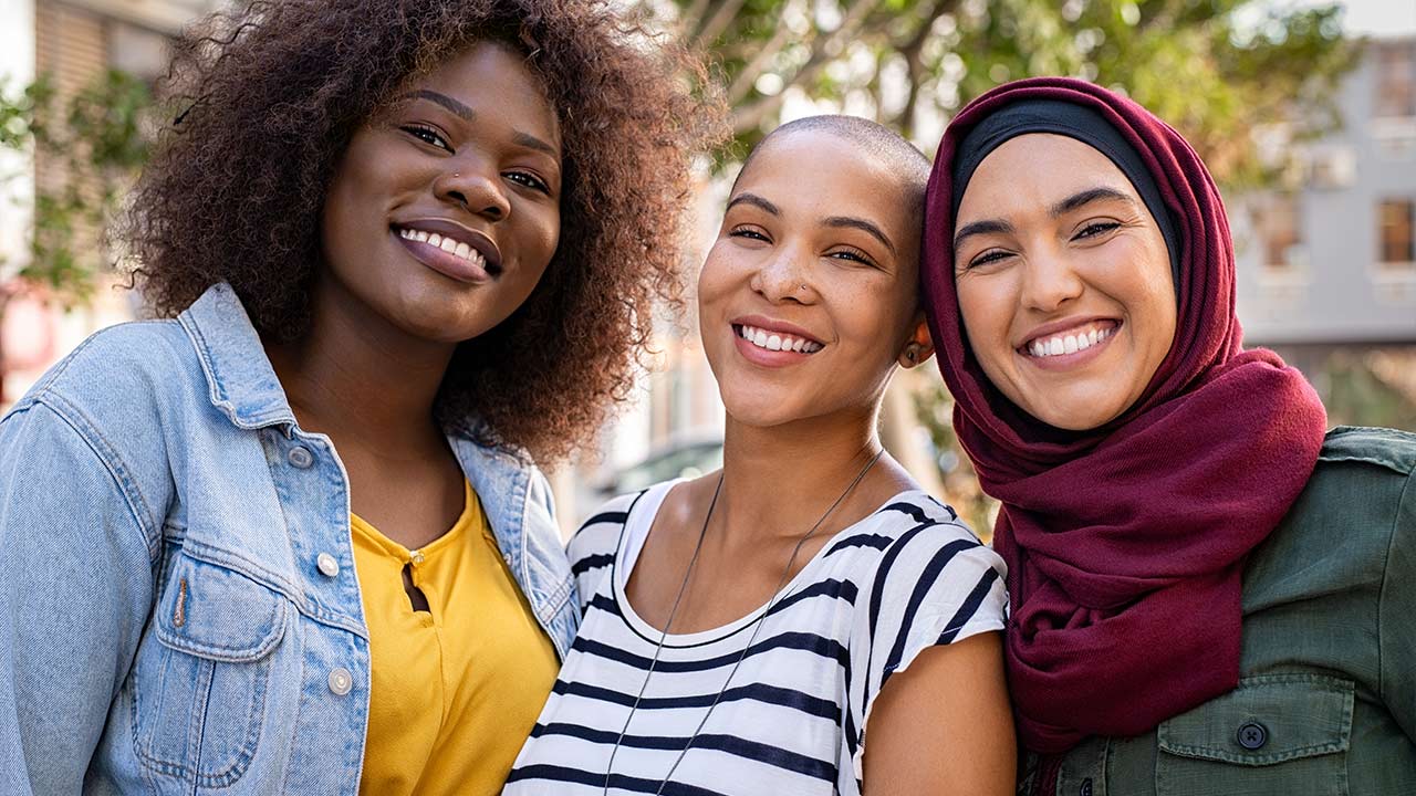 Multiethnic young friends enjoying together