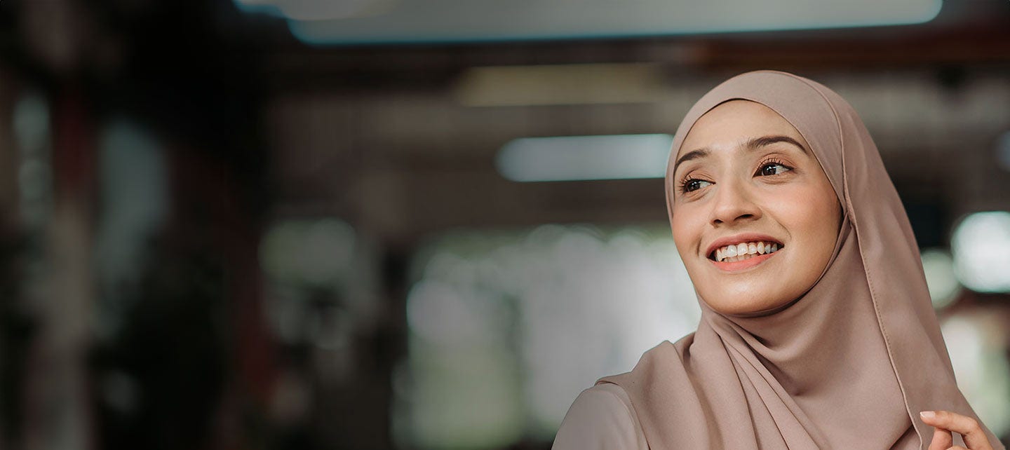 Woman smiling.