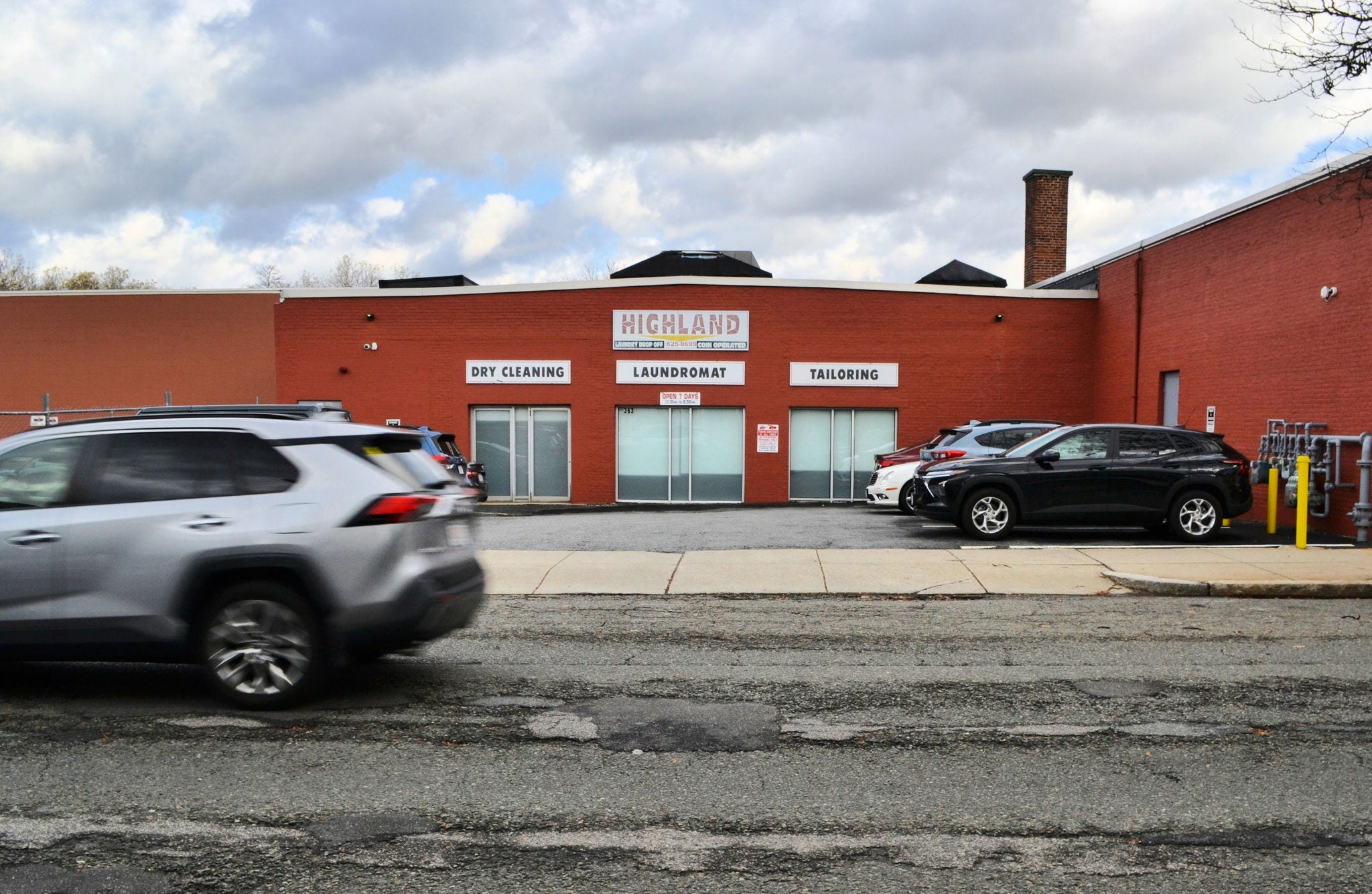 The exterior of Recorded Future with a car going by. 